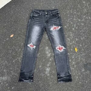 AMIRI Gray Skinny Jeans with Red Details